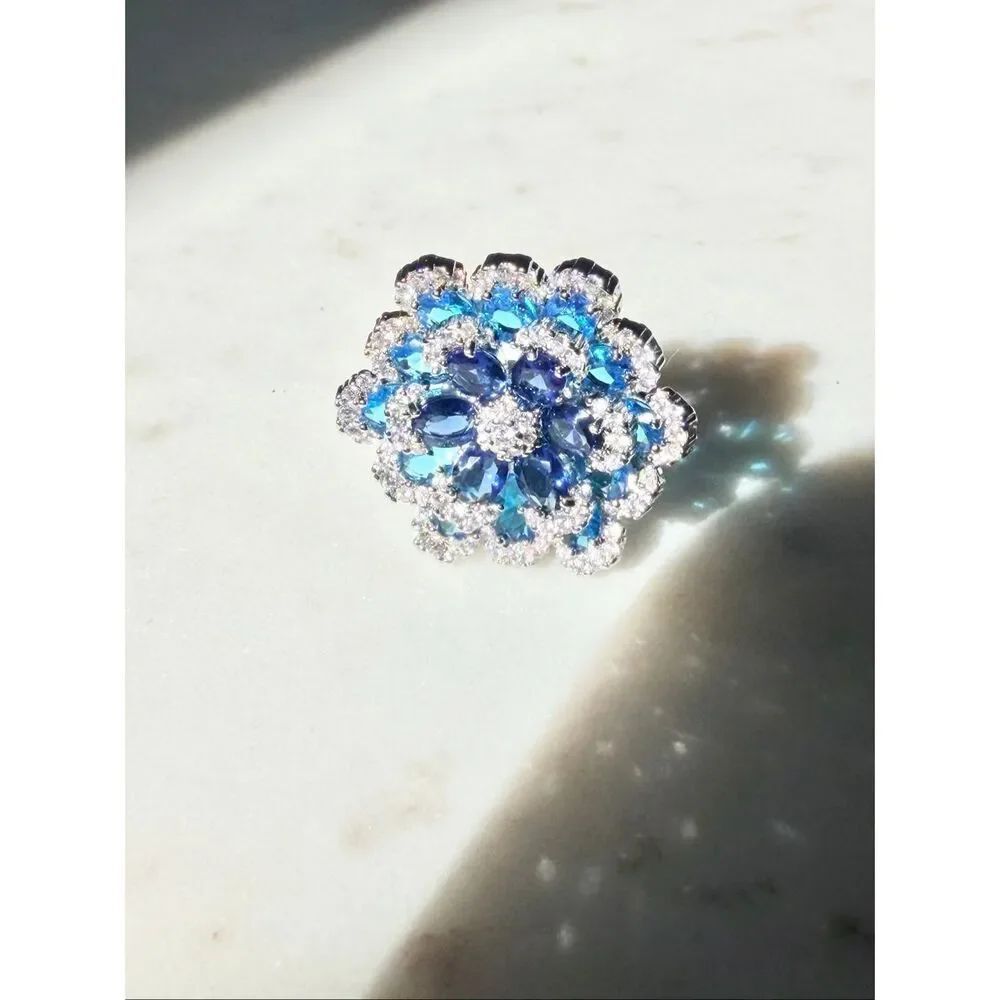 Bright blue cubic zirconia adjustable flower cocktail ring